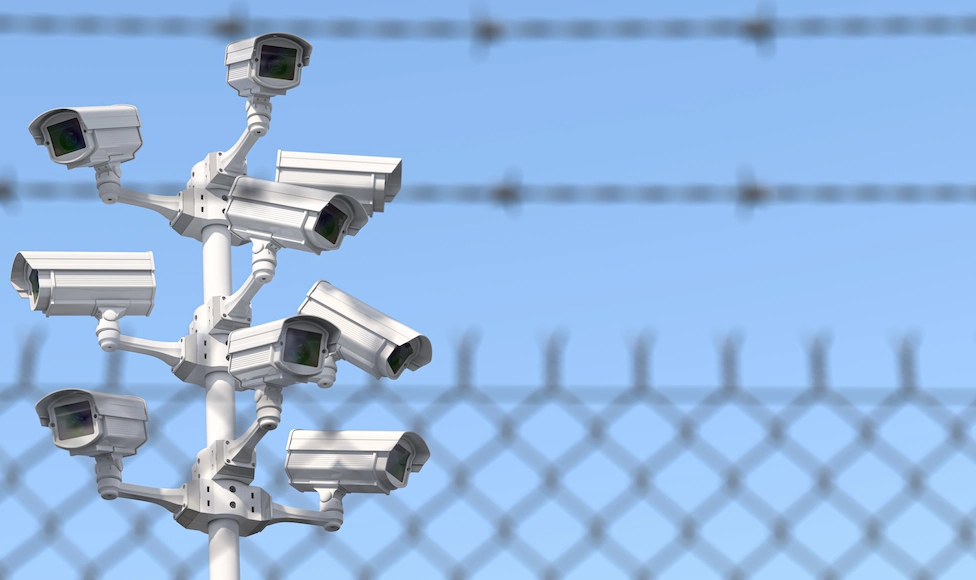 cameras and barbed wire