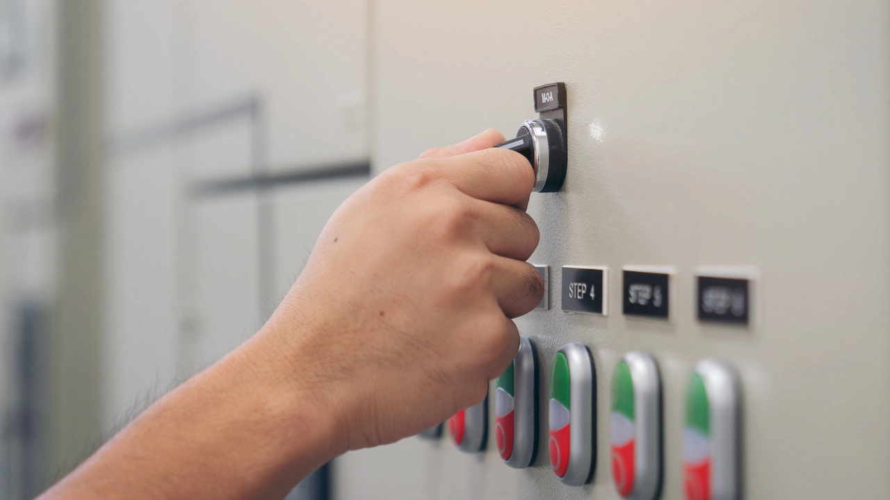 electrical engineer checking voltage and test